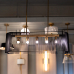 Люстра подвесная овальной формы с металлическим решетчатым абажуром матово-черного цвета и 5 лампами Kichler варинант исполнения - 7 | Loft Concept в Нижнем Новгороде